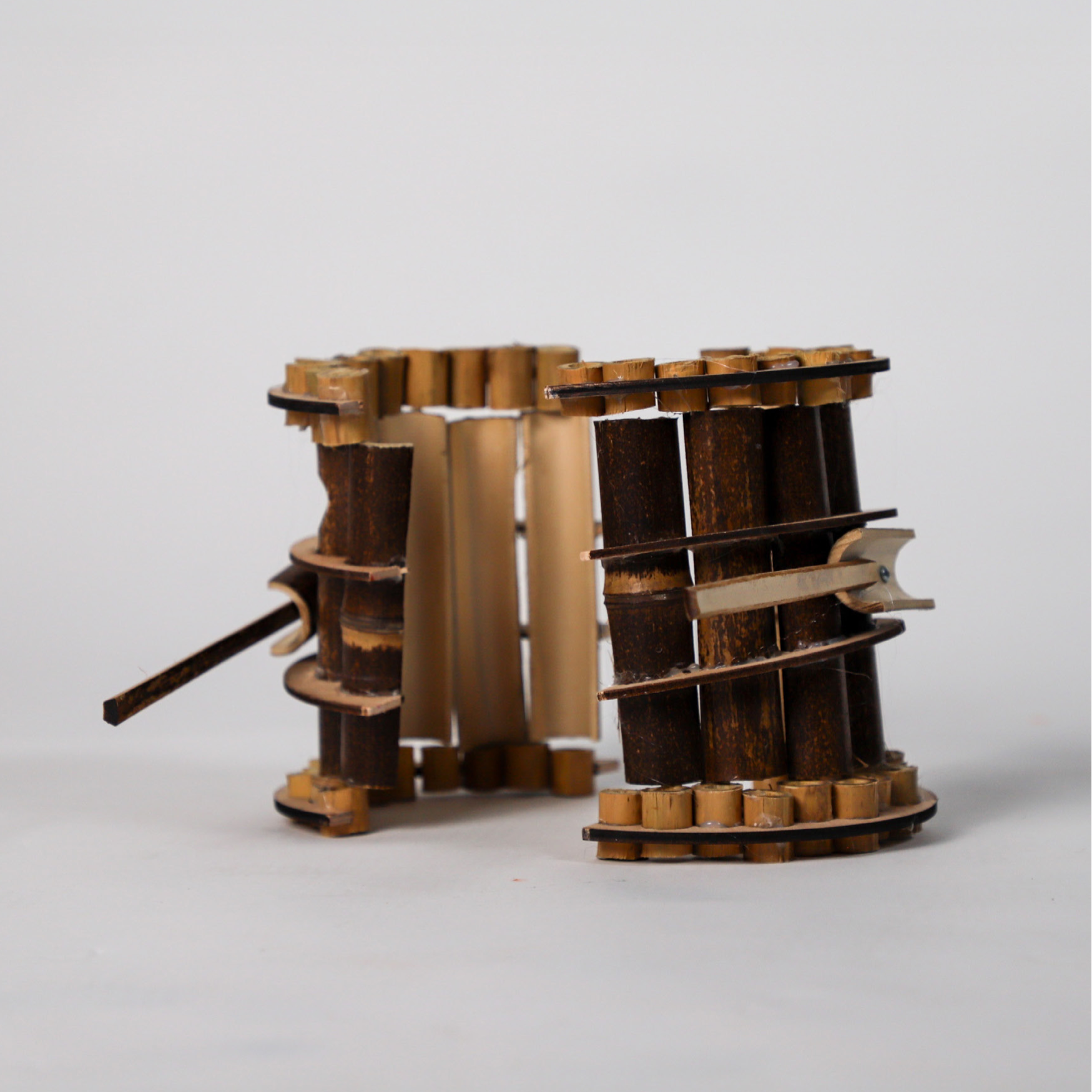 The mould — bamboo sliced to take the glass.